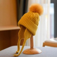 Knitted Fur Pompon Earlap Wool Winter Hat - Yellow