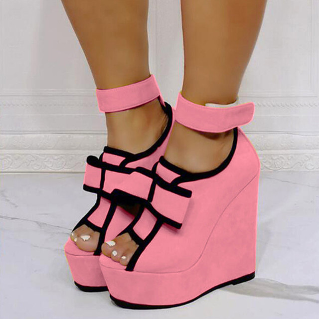 Peep Toe Ankle Buckle Straps Ribbon Platforms Wedges - Pink - Shaft Material: Flock
Insole Material: Faux Leather
Lining Material: Synthetic
Outsole Material: Rubber

US: 3 (8.46 inch) - EU: 33 ( 21.5 cm)
US: 4 (8.66 inch) - EU: 34 ( 22 cm)
US: 5 (8.86 inch) - EU: 35 ( 22.5 cm)
US: 6 (9.05 inch) - EU: 36 ( 23 cm)
US: 7 (9.25 inch) - EU: 37 ( 23.5 cm)
US: 8 (9.44 inch) - EU: 38 ( 24 cm)
US: 8.5 (9.64 inch) - EU: 39 ( 24.5 cm)
US: 9 (9.85 inch) - EU: 40 ( 25 cm)
US: 9.5 (10.03 inch) - EU: 41 ( 25.5 cm)
US: 10 (10.23 inch) - EU: 42 ( 26 cm)
US: 10.5 (10.43 inch) - EU: 43 ( 26.5 cm)
US: 11 (10.62 inch) - EU: 44 ( 27 cm)
US: 12 (10.82 inch) - EU: 45 ( 27.5 cm)
US: 13 (11.02 inch) - EU: 46 ( 28 cm)
US: 14 (11.22 inch) - EU: 47 ( 28.5 cm)
US: 15 (11.41 inch) - EU: 48 ( 29 cm)
US: 16 (11.61 inch) - EU: 49 ( 29.5 cm)
US: 17 (11.81 inch) - EU: 50 ( 30 cm)
US: 18 (12 inch) - EU: 51 ( 30.5 cm)
US: 19 (12.20 inch) - EU: 52 ( 31 cm) in Sexy Heels & Platforms