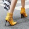 Pointed Toe Stiletto Heels Ankle High Chain Decorated Zipper Punk Boots - Yellow
