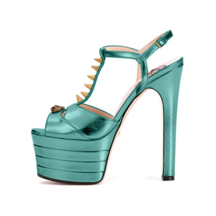 Chunky Heels Platform Peep Toe Rivet Decorated Ankle Buckle T Straps - Metallic Light Blue - Color: Metallic Light Blue / Turquoise
Upper Material: Synthetic
Insole Material: Leather
Lining Material: Leather
Outsole Material: Rubber

6.3 Inch Heel
2.3 Inch Platform in Sexy Heels & Platforms