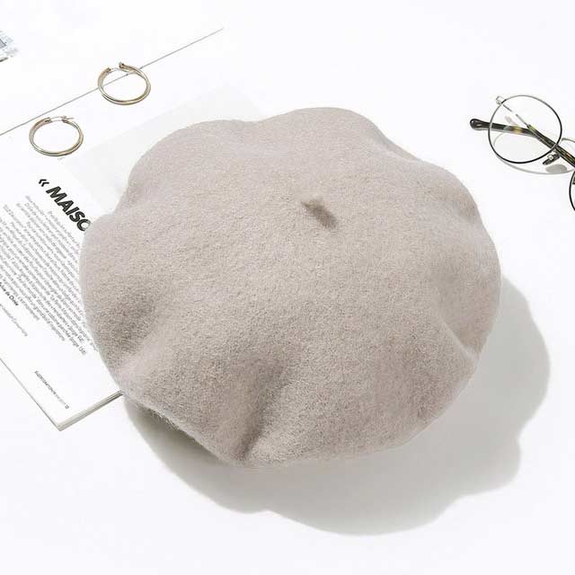 Autumn Winter Trend Wool Paris French Berets Hats - Beige - Note: Due to the different monitor and light effect, the actual color of the item might be slightly different from the color showed on the pictures. Thank you!

Material: Wool
Size: 20.8 inches / 22.4 inches in Caps, Chokers, Scarfs, Hats & Headwear