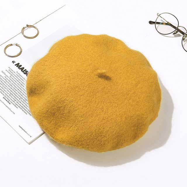 Autumn Winter Trend Wool Paris French Berets Hats - Yellow - Note: Due to the different monitor and light effect, the actual color of the item might be slightly different from the color showed on the pictures. Thank you!

Material: Wool
Size: 20.8 inches / 22.4 inches in Caps, Chokers, Scarfs, Hats & Headwear