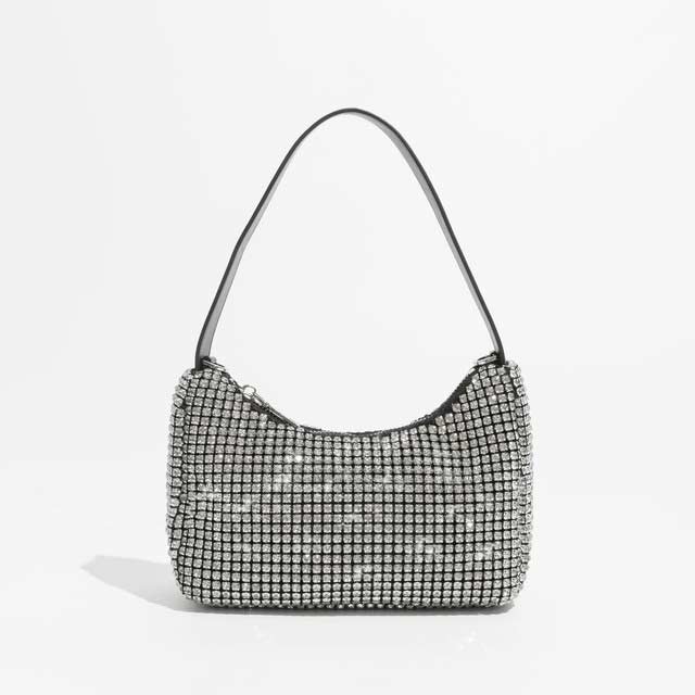 Chic Glitter Rhinestones Sparkling Crystal Crossbody Bags - Silver - 【Handbags Type】 Clutch Bag
【Clutch Bag Structure】: 1 main pocke,1 inner pockets,The tote Bags design make it convenient to pick up stuff.Enough capacity to organize your daily items,Such as,coin, cell Phone, cosmetics and more.
【Hobo Bag】Zipper closure, with 1 main pocket design , with a metal chain.fashionable purses for women, perfect for casual shopping,dating and business, the best gift for your wife, mom, girls, and family.Pair this clutch with your favorite dress and glitter in the crowd! Perfect for special events like wedding, party, prom and cocktail night. Top handle handbag with a detachable chain strap you can be hands free anytime.
【Material】High Quality Bling crystal rhinestones material,hobo shape with quilted, super soft and comfortable handtouch,luxury and simple stylich,It is the kind of great bags for women and girls.
【Size】8.27``x3.15``x5.12``(L x W x H) 21x8x13cm, with a short handle ,there will be 1~3 cm errors, weight: about 0.55kg.There is a removable metal chain.
【Note】Please allow 1-3cm differs due to manual measurement.
 in Bags, Backpacks, Handbags & Wallets